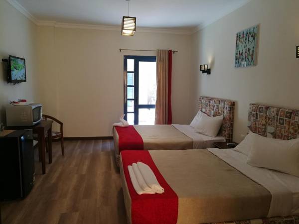 Deluxe Doppel- oder Zweibettzimmer mit Poolzugang